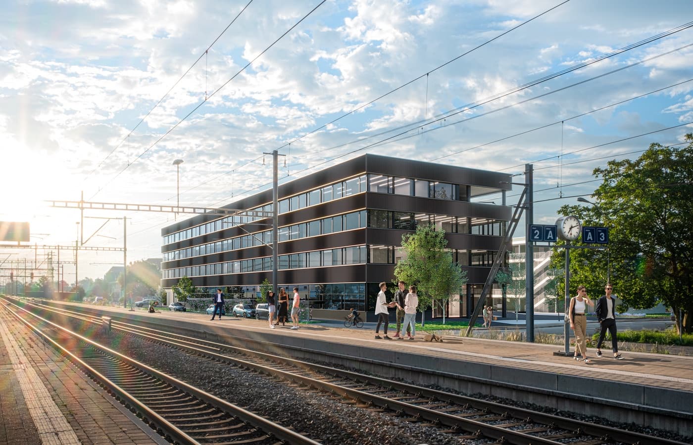 Visualisierung eines modernen Gebäudekomplexes an einer Bahnlinie